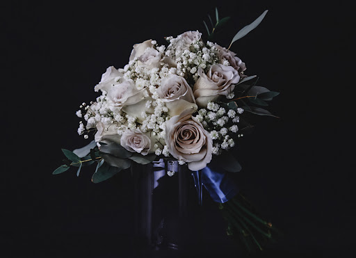 Bouquet made with roses and baby's breath for brides maid by a floral designer.