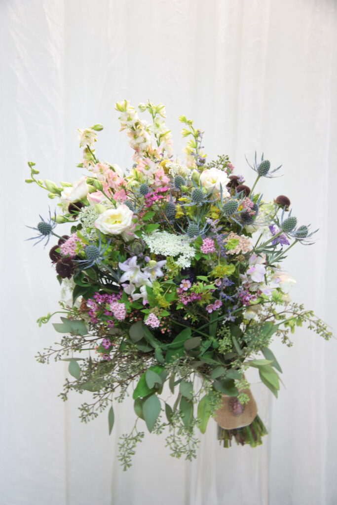 Bridal Bouquet Designed With Blue Thistle Flower